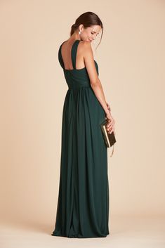 <p>Spun of sheer mesh fabric that floats with your movements, our Kiko Bridesmaid Dress features a ruched Grecian halter and stunning floor-sweeping skirt for $99.</p> Emerald Bridesmaid Dress, Emerald Bridesmaid, Emerald Green Bridesmaid Dresses, Dark Green Bridesmaid Dress, Emerald Bridesmaid Dresses, Halter Bridesmaid Dress, Grecian Goddess, Birdy Grey, Column Skirt