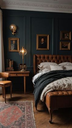 a bedroom with dark blue walls and antique furniture, including a leather bed headboard