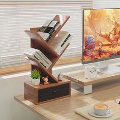 a desk with a computer and books on it