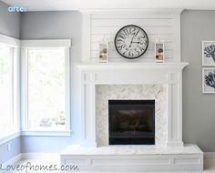 a living room with a clock on the mantle and pictures above it that says love grows