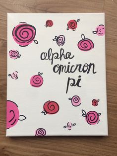 a painting with pink flowers on it and the words alpaca omeron pi written in cursive writing