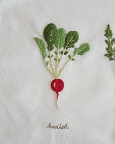 some type of broccoli with the word radish embroidered on it