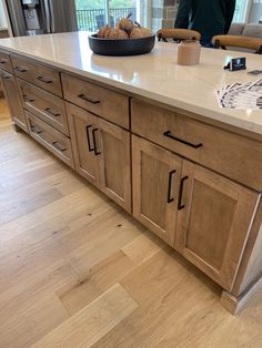 a kitchen island with two bowls on it