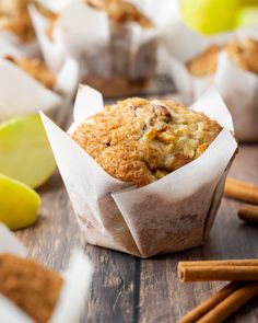 muffins with apples and cinnamon sticks on the side