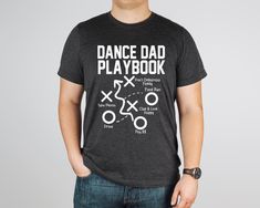 Dance Dad Playbook Shirt, Dance Dad Shirt, Dance Dad Gift, Dance Dad Tee, Funny Dance Dad T-Shirts  Tshirt is unisex and made with soft, breathable and lightweight fabric.  Sleeves are rolled up for display purposes only.  SIZE AND FIT:   Your shirt will be printed on a high-quality, soft and comfortable unisex t-shirt. Sizes run true to size, which takes the guesswork out of ordering; if you like your t-shirts loose or oversized, you might want to order a size up and if you'd like a more fitted Dance Shirts Ideas Dancers, Dance Dad Shirt Ideas, Dad Shirt Ideas, Dance Dad Shirt, Dance Shirts Ideas, Dance Shirt, Merch Ideas, Signs Funny