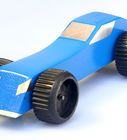 a blue toy car with black wheels on a white background