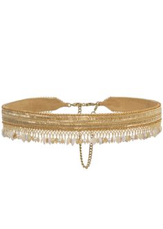 The noori waist belt gold is inspired by the textures and patterns found in legacy gold jewelry. Hand embellished with muted gold Japanese beads, luminous tubes, semi precious stones, iridescent crystals and pearls, the surface glimmers with opulence. Our signature tassels make it a statement accessory versatile enough to enhance any look. Adjustable Bohemian Gold Chain Belt, Adjustable Gold Bohemian Chain Belt, Elegant Gold Chain Belt For Festival, Bohemian Gold Chain Belt As A Gift, Bohemian Gold Chain Belt - Perfect Gift, Bohemian Gold Chain Belt Gift, Adjustable Gold Chain Belt As Gift, Bohemian Gold Chain Belt - Perfect As A Gift, Adjustable Gold Chain Belt Gift