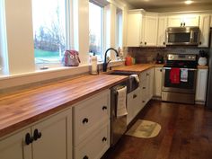 the kitchen is clean and ready for us to use in its new owner's home