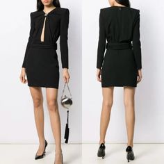 Saint Laurent Black Cut Out Cocktail Mini Dress New With The Tags 100% Authentic Size: 38 (Us S) Material: 53% Acetate & 47% Viscose Lining: 100% Silk Dry Clean Black Mini Dress Gathered V-Neckline With Silver Chain Embellishment Cut-Out Opening Down The Center Front To Waist Attached Pleated Waist Sash With Side Hook & Eye Closure Padded Shoulders Long Sleeves With Zipper Cuff New With The Tags, Never Worn! Approx. Measurements: Across The Underarms: 17.5" Sleeve Length From Underarms: 17.5" Le Music Dress, Saint Laurent Dress, Cocktail Mini Dress, Pink Silk Dress, Metallic Mini Dresses, Waist Sash, Cocktail Dress Black, Black Mini Dress, Denim Mini Dress