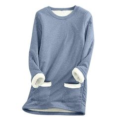 a blue sweatshirt with white shears on the sleeves and cuffs, in front of a white background