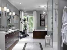 a large bathroom with an exercise bike in it