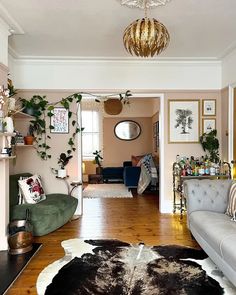 a living room filled with furniture and decor