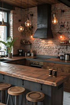 an industrial style kitchen with brick walls and wooden counter tops, stools at the bar