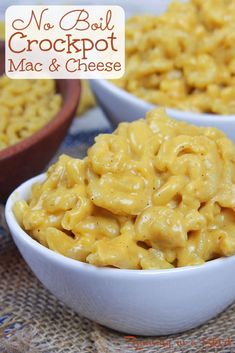 two bowls filled with macaroni and cheese