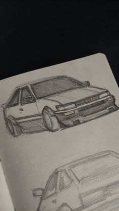 two drawings of cars are shown in this drawing book, one is black and the other is white