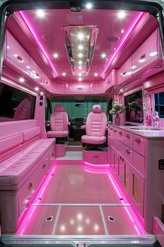 the interior of a pink limo with its lights on