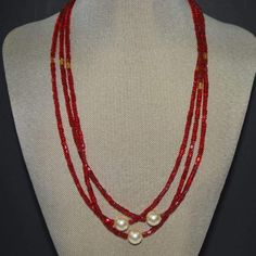 Multi Strands Red Beads With Pearl Ascent Elegant Necklace - FashionByTeresa Red Double Strand Beaded Necklaces, Red Double Strand Faceted Beaded Necklaces, Red Double Strand Faceted Beaded Necklace, Red Double Strand Beaded Necklace With Faceted Beads, Red Double Strand Beaded Necklace With Polished Beads, Multi-strand Red Coral Beaded Necklace As Gift, Multi-strand Red Coral Beaded Necklace For Gift, Red Double Strand Beaded Jewelry, Red Beaded Double Strand Jewelry