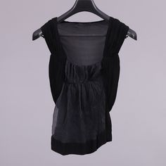 Donna Karan ladies vintage black silk sleeveless vest top-EU 34-UK 6-US 2-circa 1990s (Weight: 202g) free postage The top is made of silk and is in excellent condition with the following approximate measurements: Overall length (from behind edge to edge): 54cm; Chest (armpit to armpit): 36cm FREE POSTAGE WORLDWIDE Black Silk Camisole Top, Fitted Sleeveless Blouse Vest For Layering, Black Silk Camisole Chic Style, Black Silk Sleeveless Tank Top, Black Silk Camisole For Spring, Chic Black Silk Camisole, Silk Fitted Tank Top For Evening, Black Vest For Spring Layering, Sleeveless Silk Stretch Top