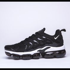 Left Shoe Has Extra Glue Around Front Tip. Over Seven Years In The Making, The Men's Nike Air Vapormax Plus Running Shoes Are A Transcendent Revolution. This Sleek Hybrid Sneaker Not Only Brings The Comfort You Crave, The Unique Style Makes Them A Standout, Wearable Style For Everyday Use. A Snug, Foot-Hugging Bootie Construction Provides The Stability You Want, While Iconic Vapormax Cushioning Enhances That Springy Bounce You Can Feel With Every Step. Completely Transforming The Standard Air Ma Functional Black Nike Air Max With Round Toe, Dynamic Black Custom Sneakers With Air Cushioning, Black Nike Air Max High-top With Air Cushioning, Casual Black Nike Air Max With Round Toe, Nike Air Max Black With Air Cushioning, Black Dynamic Nike Air Max, Nike Air Max Black Running Shoes With Air Cushioning, Black Nike Air Max High-top With Cushioned Footbed, Black High-top Nike Air Max For Running