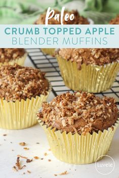 some muffins are sitting on a cooling rack with the words, paleo crumb topped apple blender muffins