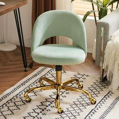 a blue office chair sitting on top of a rug