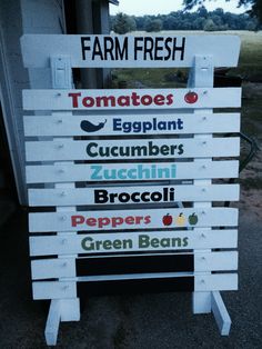 a sign that says farm fresh with many different types of vegetables and fruits on it