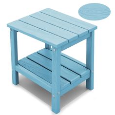 a small blue wooden table sitting on top of a white floor