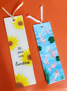 two bookmarks with the words be your own sunshine and koi fish