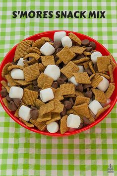 a red bowl filled with marshmallows and s'mores snack mix