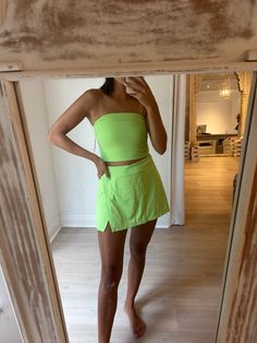 Get ready to turn heads with our Gigi Set. Made of nylon, this set comes in vibrant neon lime green and classic black to add some excitement to your summer active wardrobe. The strapless crop top and mini skort make for a playful and fun look. Don't miss out! Cheap Cute Multicolor Sets, Cheap Solid Color Playful Sets, Cheap Multicolor Matching Sets, Neon Two Piece Outfit, Neon Outfits Party Night, Neon Outfits Party, Neon Outfit Ideas, Neon Party Outfits, Bright Outfits