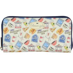 Discover the great accessory to channel your inner Lorelai or Rory with this Gilmore Girls wallet. Designed with the utmost attention to detail, this wallet captures the essence of Stars Hollow in every stitch. This cream-colored wallet features an allover design of Dragonfly Inn and other graphics like Luke's Diner sign, Stars Hollow sign, pizza, hamburgers, and others. Made from great faux leather, it offers both style and durability. The zip-around closure ensures your essentials are secure, Luke’s Diner Sign, Gilmore Girls Tote Bag, Stars Hollow Sign, Lukes Diner Sign, Gilmore Girls Dragonfly Inn, Gilmore Girls Merchandise, Gilmore Girls Party, Luke's Diner, Gilmore Girls Gifts