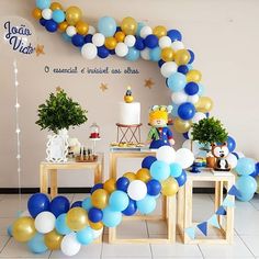 a birthday party with balloons and decorations