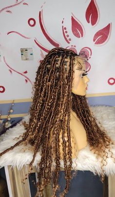 * Faux locs on a fibre full lace wig. Unit can be styled as desired Color- 30 Each wig unit is carefully hand-made by professional braiders. The braids can last for years. For a natural look, the wigs can be made with a lace closure, lace frontal or full lace. Wig care instructions and styling options are provided with each purchase.  Braided wigs is the current style in vogue now look savvy, hot and fab be beautiful in a split seconds neatly made in wig cap the braids are tiny, full and light in weight wear and you are ready to go perfect for times you want to protect your hair from excessive weaving.it's a must have no one will know its a wig . it can be styled into different beautiful styles Visit us at merithair.com For more trending styles and enjoy Up to 50% discount Medusa Locs, Bohemian Goddess Locs, Distressed Faux Locs, Locs Soft, Faux Locs Wig, Soft Dreads, Cornrow Wig, Teenage Hairstyles, Wig Care