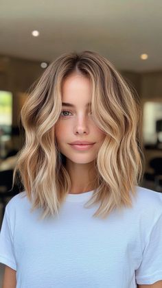 Embrace a softer side with these 15 honey blonde hair ideas! Perfect for those who love a natural, understated look, these shades will add a gentle warmth to your hair. #HoneyBlonde #BlondeHair #HairColor #HairTrends #HairInspiration Brunette Blonde Ombre Hair, Lived In Look Hair, Blonde And Gold Highlights, Medium Length Fall Hair Color Blondes, Soft Light Brown Hair Balayage, Balayage Hair Shoulder Length Blonde, Natural Looking Blonde Hair Dark Roots, Blonde Hair Color Ideas Easy Grow Out, Blond Foils On Brown Hair