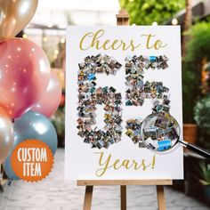 a sign that says cheers to 50 years with photos and balloons in the foreground