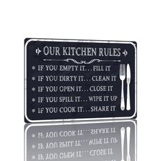 a sign that says, our kitchen rules if you empty it fill it if you open it close it if you spill it if you cook it