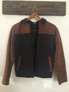 "Amazing condition vintage genuine leather and suede zip up motorcycle style jacket. It's fully lined and made in Argentine. There are no size tags measurements are as follow: Chest: 36\" Waist: 32\" Total length: 22\"" Brown Suede Long Sleeve Biker Jacket, Brown Leather Jacket With Suede Overlays, Brown Suede Leather Jacket With Zipper Closure, Brown Suede Leather Jacket With Zipper, Brown Suede Biker Jacket, Winter Brown Suede Biker Jacket, Vintage Brown Suede Leather Jacket, Black Suede Leather Jacket For Fall, Vintage Fitted Suede Leather Jacket