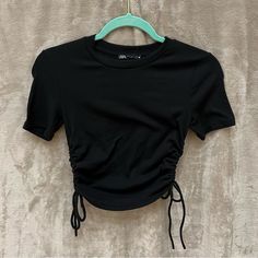 Brand New Without Tags Stretchy Perfect Condition Above Belly Button Crop Super Cute And Comfortable No Flaws Crop Tops For Women Stylish, Casual Black Top With Drawstring, Black Crop Top Outfit Casual, Casual Black Ruched Top, Baju Crop Top, Black Cropped T-shirt For Summer, Fitted Ruched Zara Tops, Black Cropped T-shirt, Black Crop Top