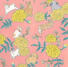 a pink background with rabbits and flowers on it