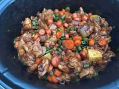 chicken, carrots and pineapple stir fry in a slow cooker to be cooked