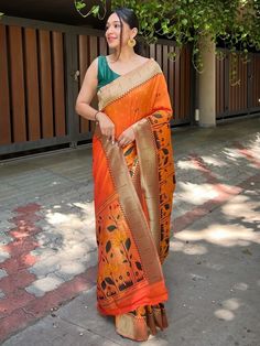 Discover exquisite craftsmanship with our orange banarasi paithani silk saree and matching saree blouse. Made from pure silk, this saree showcases the mastery of traditional Indian weaving techniques, resulting in a stunning and elegant design.
The highlight of this saree is the beautifully woven resham zari, which adds a touch of opulence and grandeur. The intricate 12-inch meenakari flower design at the border is a testament to the skill and artistry of our talented artisans.With a length of 5 Traditional Orange Banarasi Silk Pre-draped Saree, Traditional Orange Pre-draped Saree With Zari Weaving, Traditional Orange Art Silk Pre-draped Saree, Orange Chanderi Saree For Diwali, Orange Dola Silk Saree With Pallu, Orange Art Silk Blouse Piece With Cutdana, Orange Chanderi Saree In Traditional Drape, Orange Art Silk Saree With Zari Work, Orange Dola Silk Pre-draped Saree With Pallu