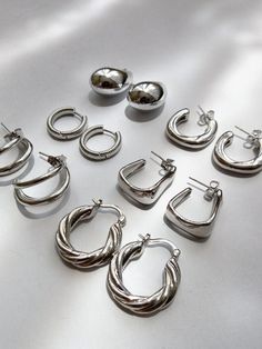 Silver, silver hoop earrings, silver chunky hoops, silver earrings, earrings, chunky hoop, y2k, accessories, jewelry, bijou, silver, silver jewelry, argollas, argollas plateadas, joyería plateada, pendientes plateados, fashion, style, trend, basic, essentials, aesthetic, pinterest girl, minimal chic, effortless chic Silver Jewelry Hoop Earrings, Silver Hoop Earrings Chunky, Sterling Silver Earrings Aesthetic, Basic Silver Jewelry, Silver Hoops Chunky, 2025 Accessories Trends, Silver Trendy Jewelry, Earings Aesthetics Silver, Silver Girl Jewelry