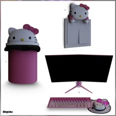 an image of a desktop computer with hello kitty on the top and mouse next to it