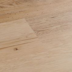 a wooden table top with wood grains on it