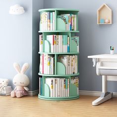 there is a book shelf with many books on it in the corner next to a desk