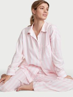 Crafted in an ultra-soft modal-cotton blend, these classic PJs are what dreams are made of. Oversized fit Long sleeve, button-front top hits at hips Chest pocket Pants with elastic waist Soft, plant-derived modal fibers, sourced from sustainably managed forests Machine wash Imported Long Pyjamas, Lingerie Catalog, Victoria Secret Pajamas, Pajamas Sets, Cute Pajamas, Victoria Secrets, Women Nightwear, Pyjama Set, Short Pajama Set