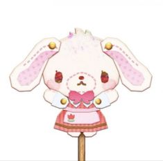 a cute little bunny on a stick with a pink dress and bow tie, standing upright