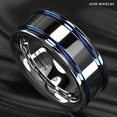 men's wedding band with blue and black inlays on the inside of it