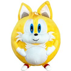 a yellow stuffed animal with blue eyes and white paws on it's face, sitting in front of a white background