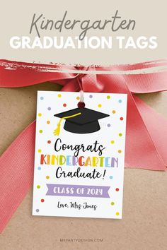 a graduation card with the words congratulations on it and a red ribbon tied around it